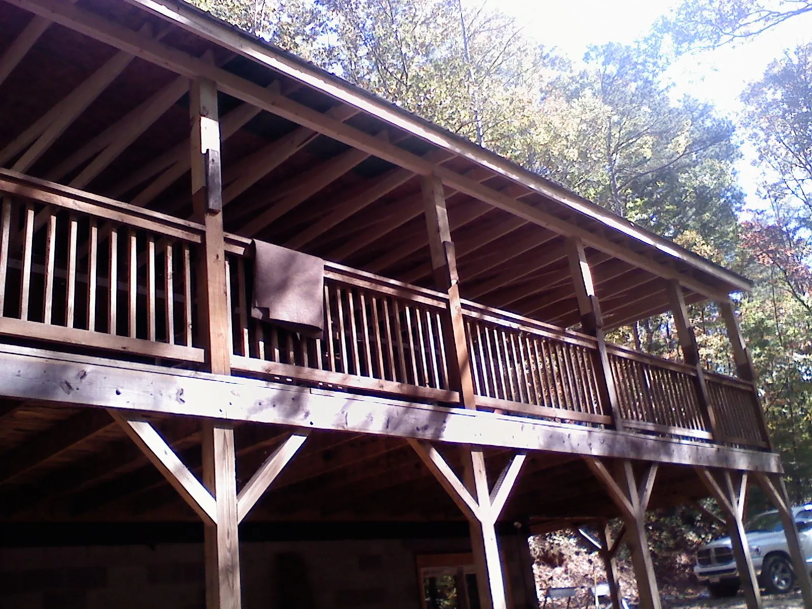 Timber framing under a new elevated porch and deck — Roof Leak Repair in Vilas by Roofing Brothers